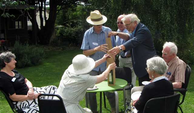 Canon Alan Watson being presented with a gift