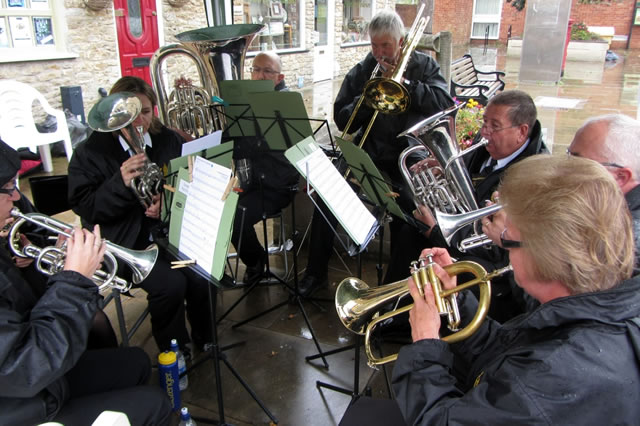 Wincanton Silver Band playing at the first new Wincanton Street Market