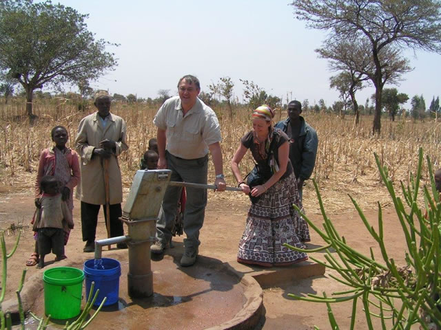 Richard and Bryony Loader using a waterpump they've installed