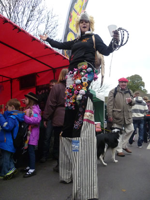 Stilt walker, Lizzie the Fire Eating Lizard