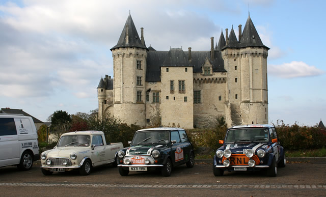 Classic cars pose near a stunning French castle