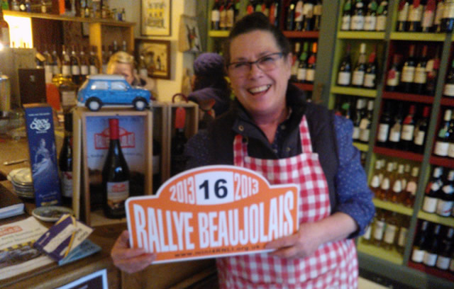 Jenny holds the bottle in Divine Wines, her shop on Wincanton High Street