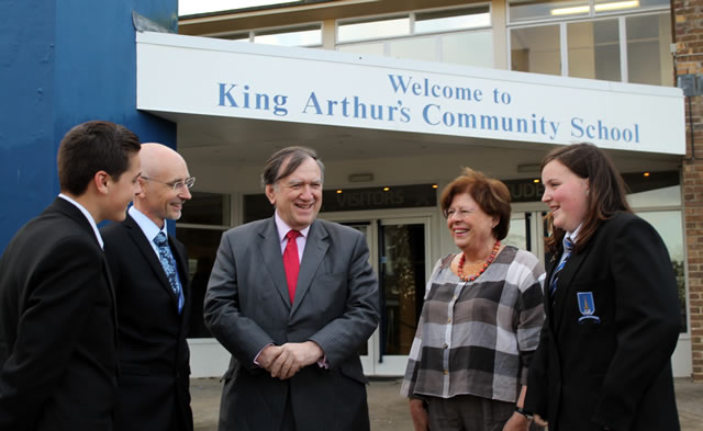 Shaun Bardwell-Dix, Headteacher Chris Beech, Sir Robert and Lady Hilary Burgess, Evelyn Adams, outside King Arthur's School entrance