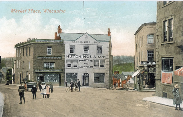 Children gather for a photograph in front of Hutchings & Sons in the Market Place circ. 1905