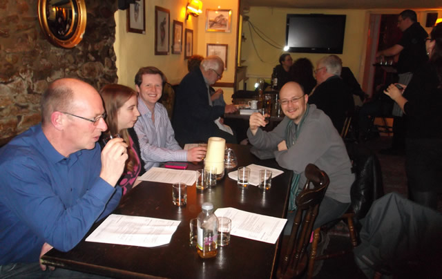 Whiskey club members enjoying the samples