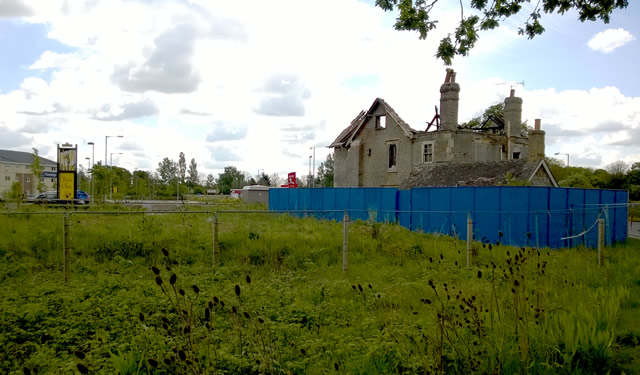 The burnt out house on Wincanton's new commercial estate