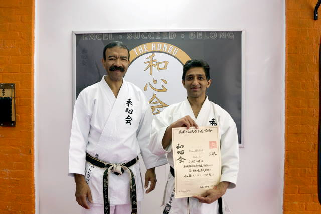 Shaz Shahid receiving his 6th Dan certificate