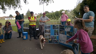 Briefing at HQ, on the recreation ground bridge