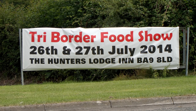 The Tri-Border Food Show banner, outside The Hunter's Lodge