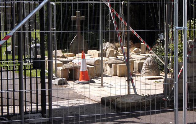 The organised rubble of the demolished gate wall