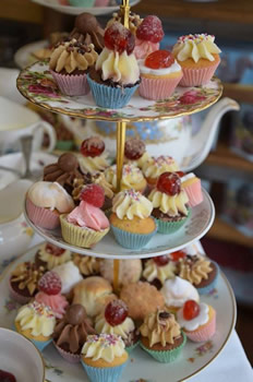 Cupcakes on a three-tier cake stand