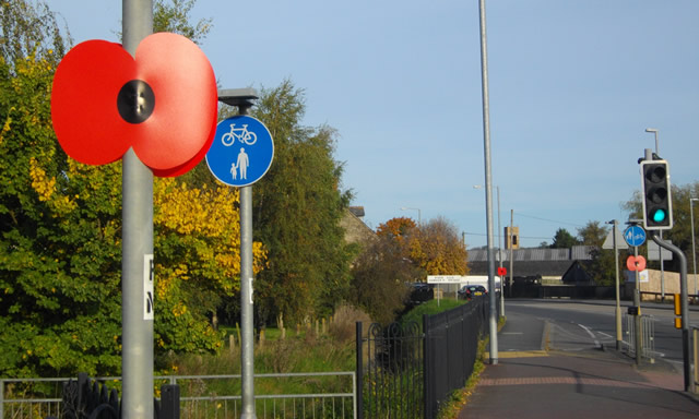 Royal British Legion display poppies tied to posts throughout Wincanton