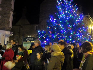 Carols around the tree