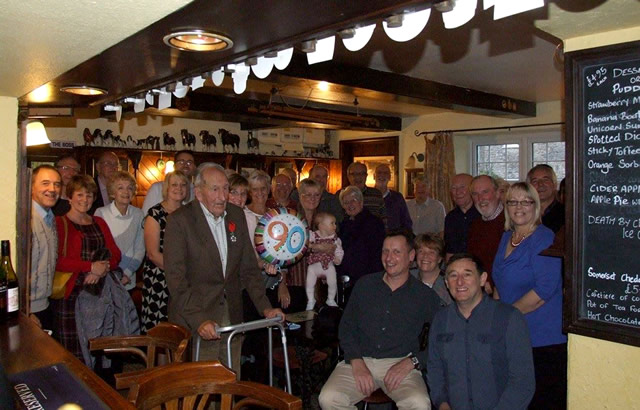 John Keynes surrounded by his many friends on his 90th birthday