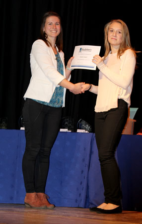 Ex-KA student, Dr Emily Colbeck presenting an award