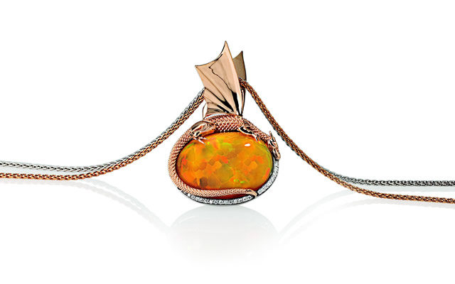 Alex Appleton's newest creation - an opal set in diamonds encircled by a gold dragon
