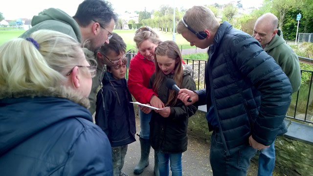 Sophie Hunt reading out the next clue