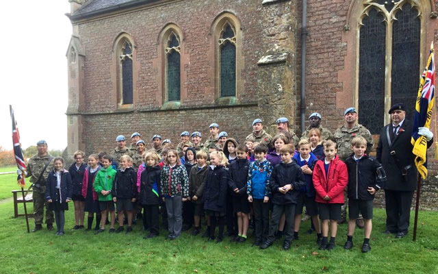Horsington Church Primary School children and soldiers outside St John's Church