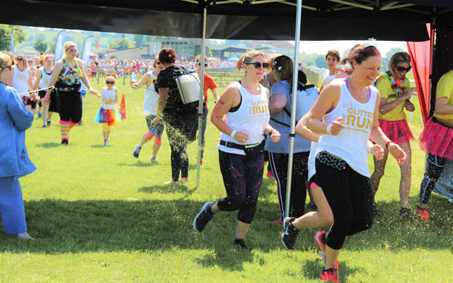 St. Margaret’s Hospice’s award-winning Glitter Run is coming back to Wincanton Racecourse in May 2019