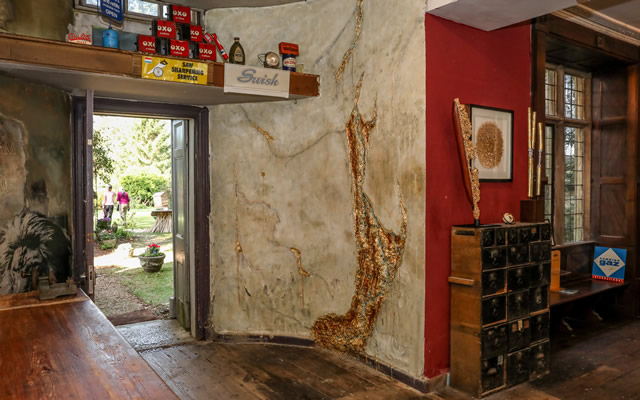 The rear of the Greening the Earth gallery in Wincanton, looking out the door to the garden features