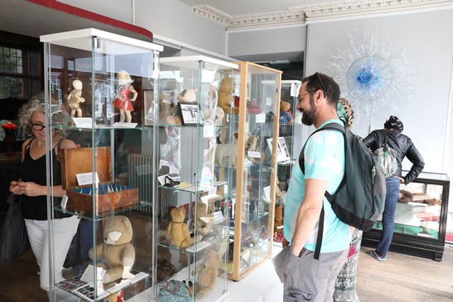 Visitors looking at the exhibits in the front of the Greening the Earth gallery in Wincanton