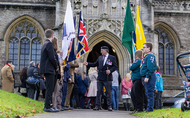 Wincnaton's 2019 Remembrance Parade flag bearers at the entrance of the Parish Church of St. Peter & St. Pauls