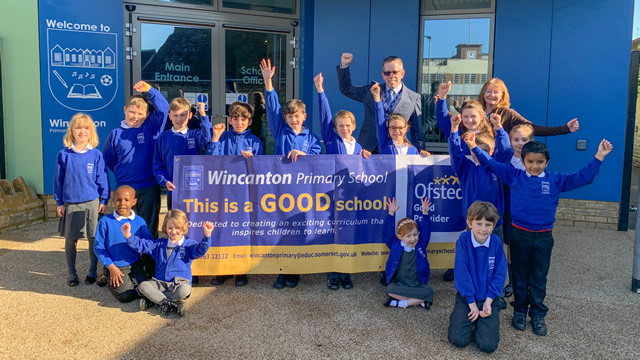 Wincanton Primary School staff and pupils celebrate a GOOD report from Ofsted