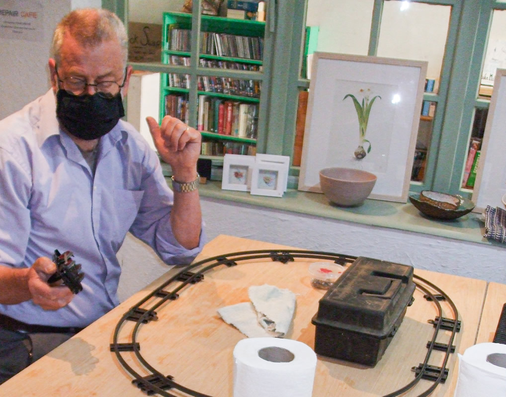 Clockworks specialist Trevor Findley repairing a train set
