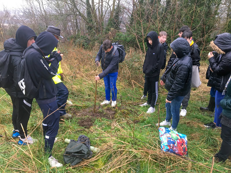 King Aruthur's School students planting an oak sapling