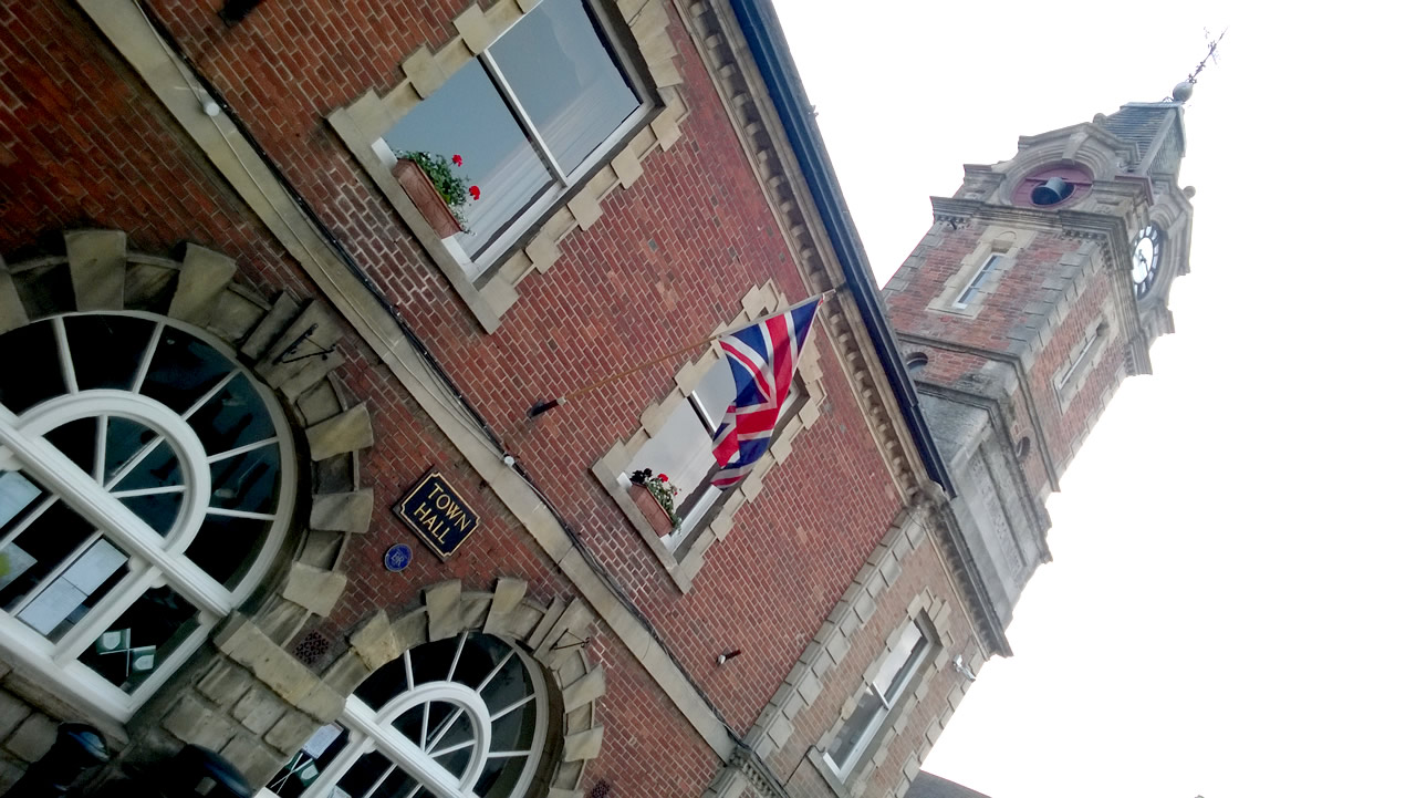 Wincanton Town Hall and clock tower with flag flying