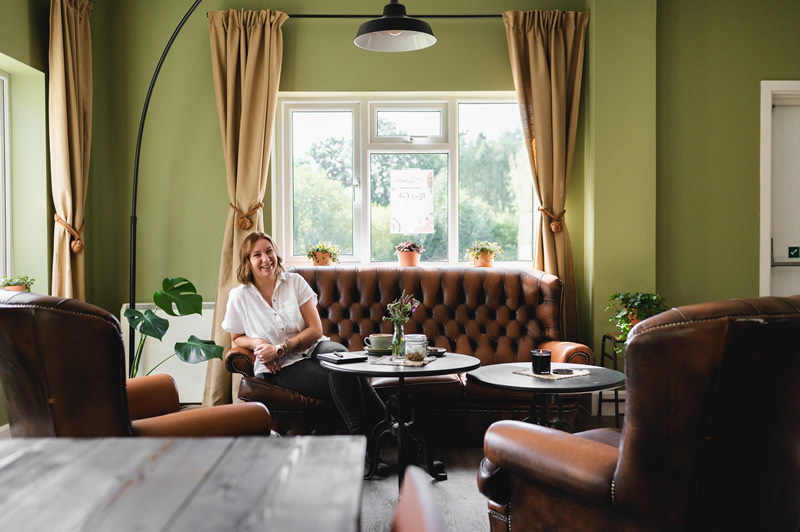 Photo by Angelika Koziak Photography: Iwona Kostrzewa sitting in her new River Cale Cafe at Cale Park, Wincanton