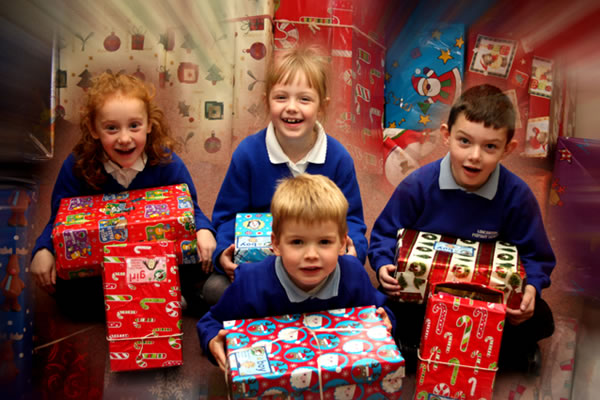 Pupils pack showbox gifts for children